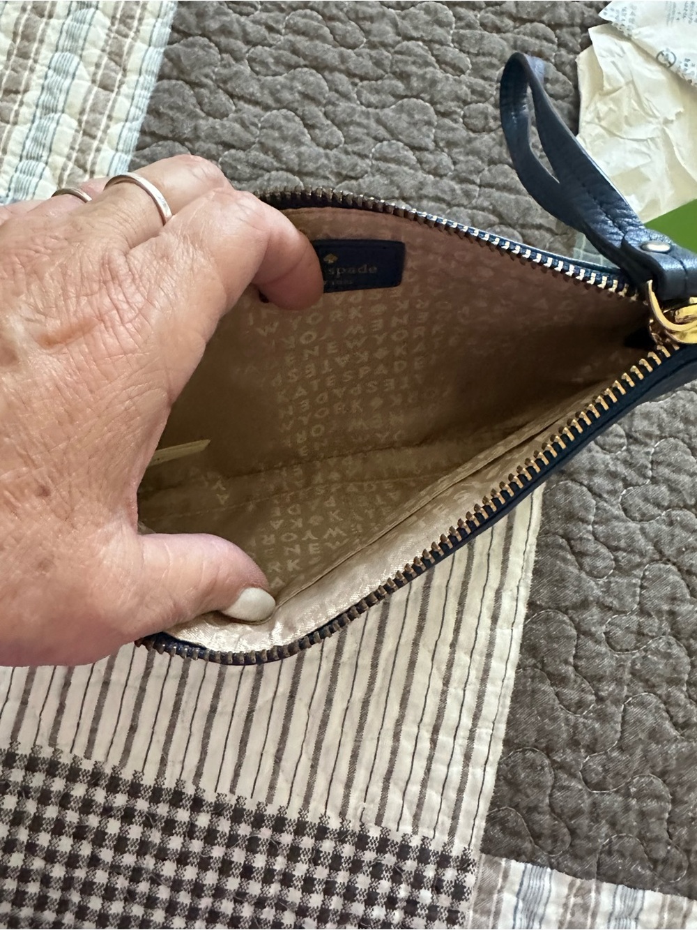kate spade navy leather wristlet with gold hardware